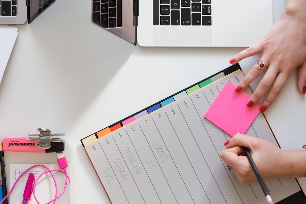 planner with sticky notes